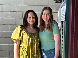 Two young women smiling 
